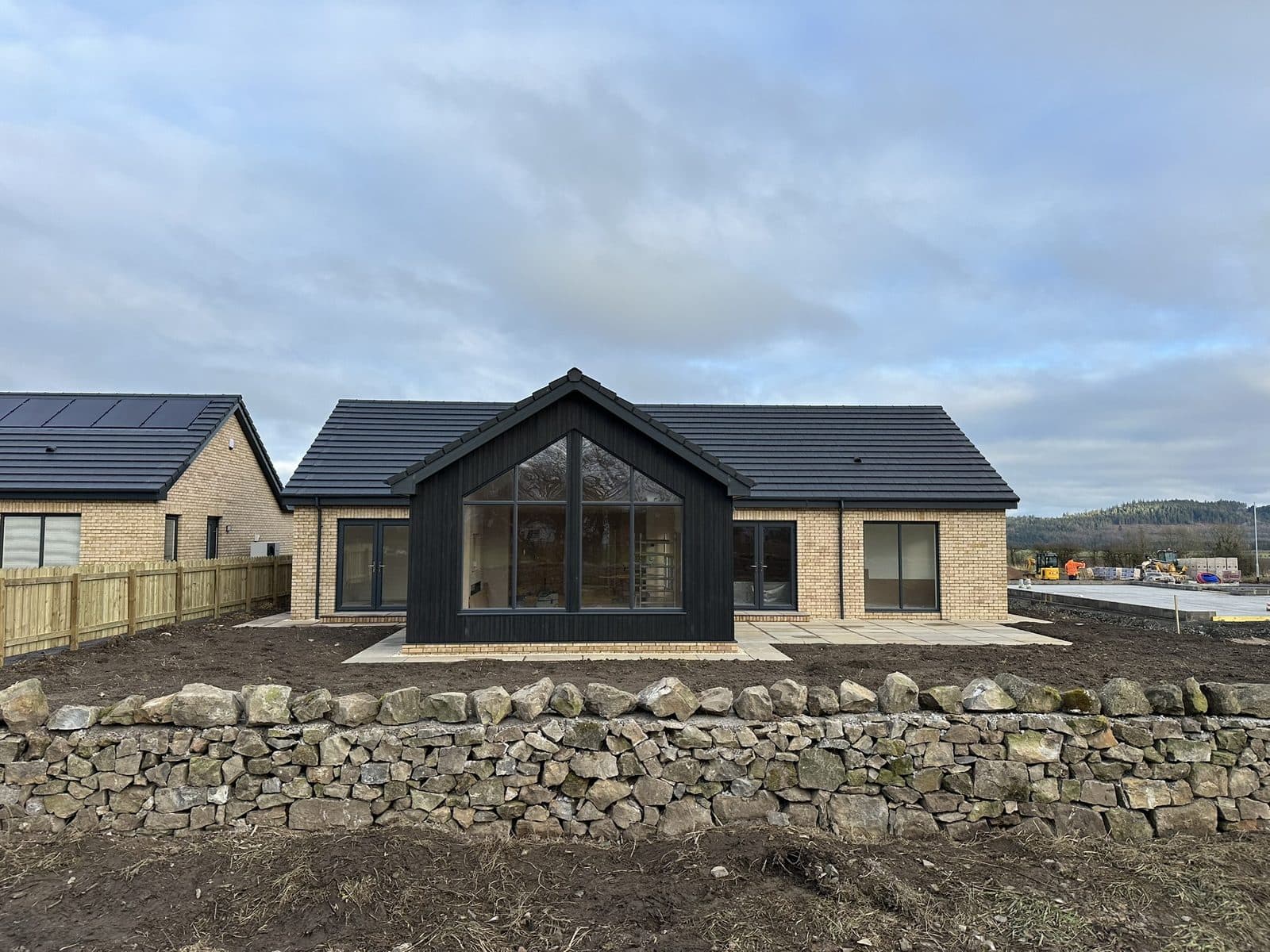 Solar panels on a bungalow roof installed by GMC